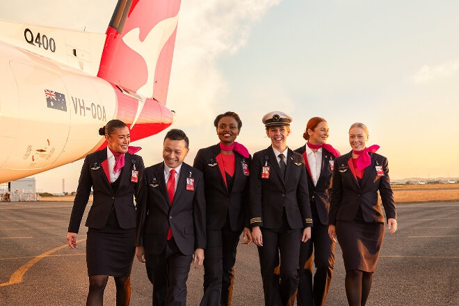 Qantas crew walking on the tarmac