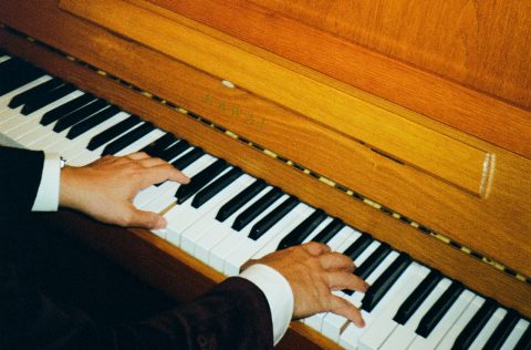 Pianist playing on the Belmond Eastern Oriental Express