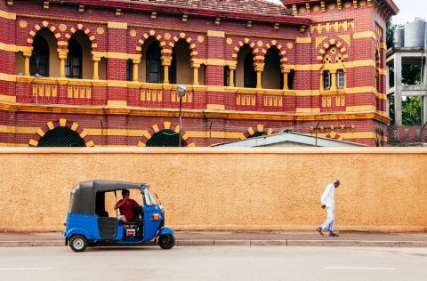A tuk tuk outside of the Victoria Memorial Building in Colombo, Sri Lanka