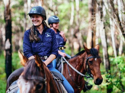 woman riding on horse